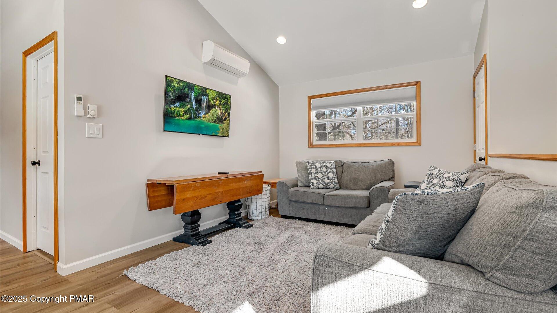 277 Fern Ridge Road Blakeslee, PA 18610 - Photo 5 of 46 a living room with furniture and a couch