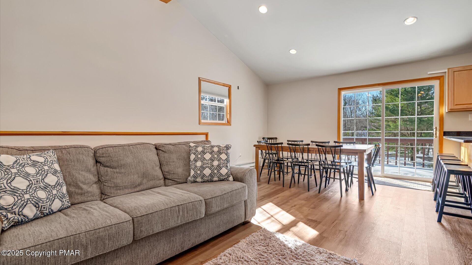 277 Fern Ridge Road Blakeslee, PA 18610 - Photo 7 of 46 a living room with furniture and a table