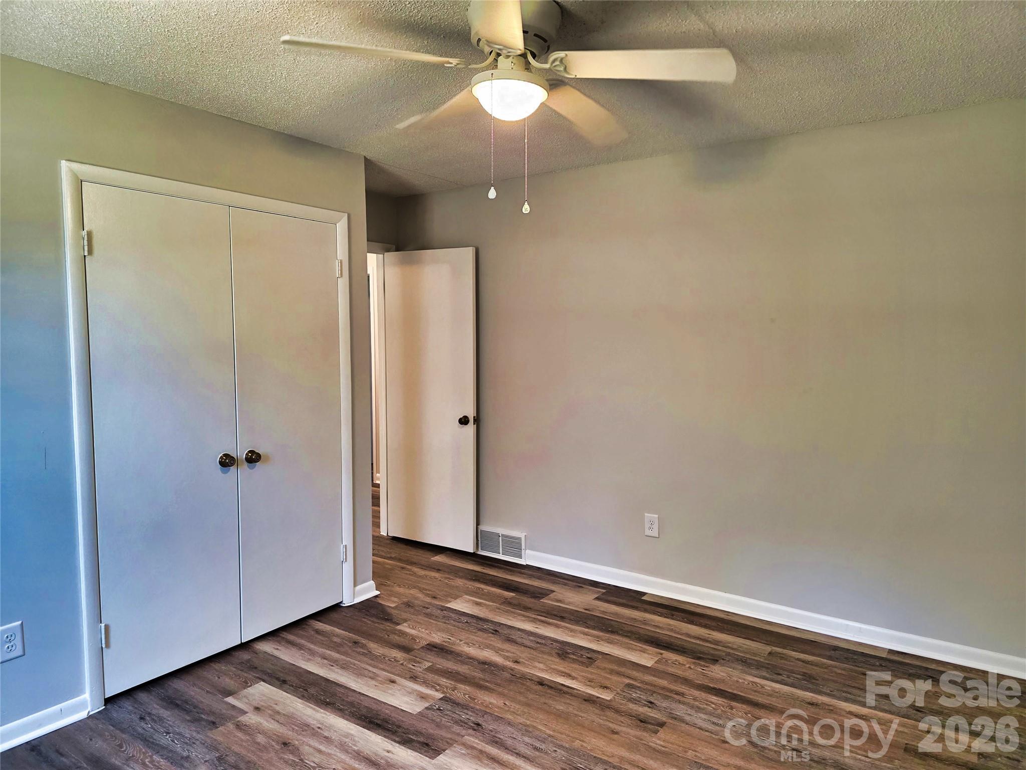 323 Mt Bethel Road Harmony, NC 28634 - Photo 15 of 25 wooden floor in an empty room