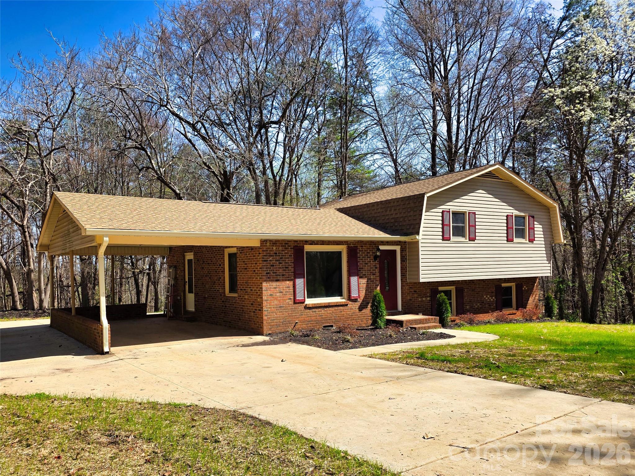 323 Mt Bethel Road Harmony, NC 28634 - Photo 2 of 25 a front view of a house with a yard