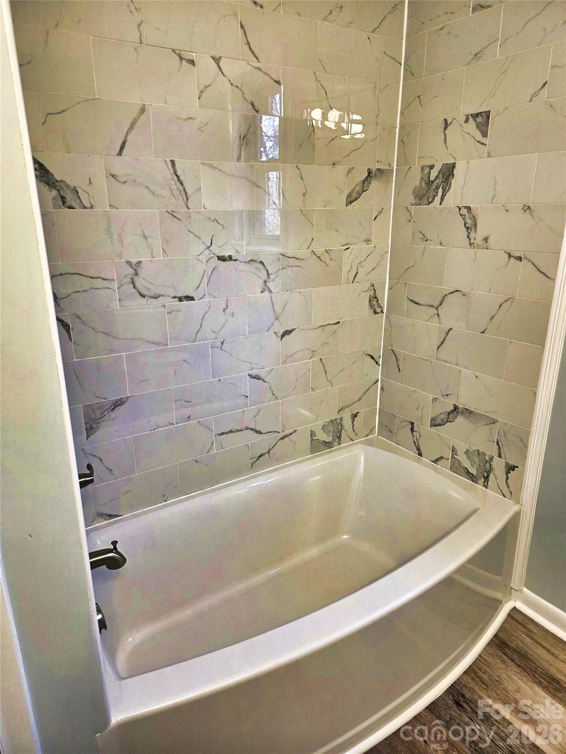 323 Mt Bethel Road Harmony, NC 28634 - Photo 24 of 25 a view of a bathtub in bathroom