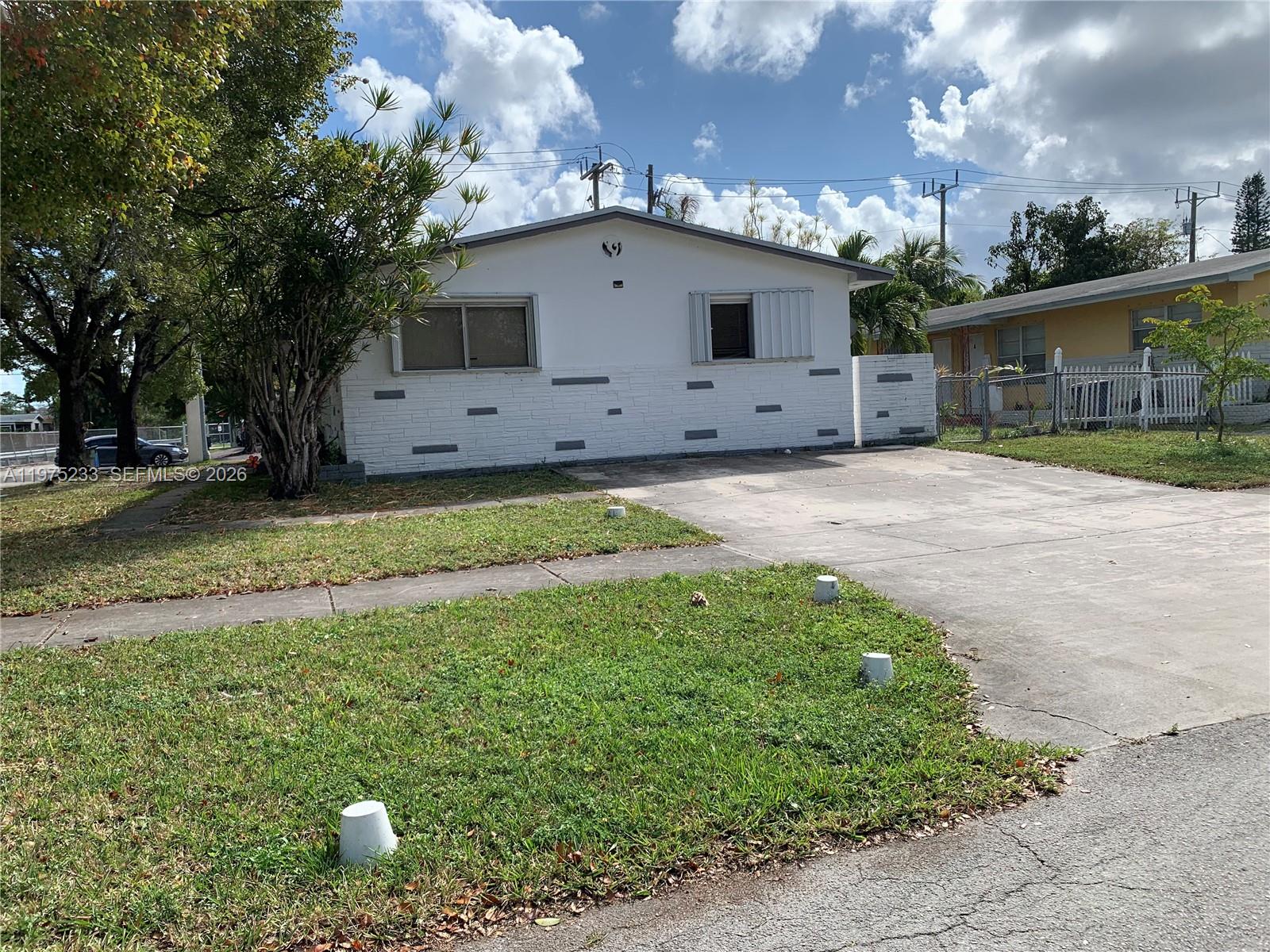 401 Southwest 8th Street, Unit A Hallandale Beach, FL 33009 - Photo 17 of 17 a view of a backyard