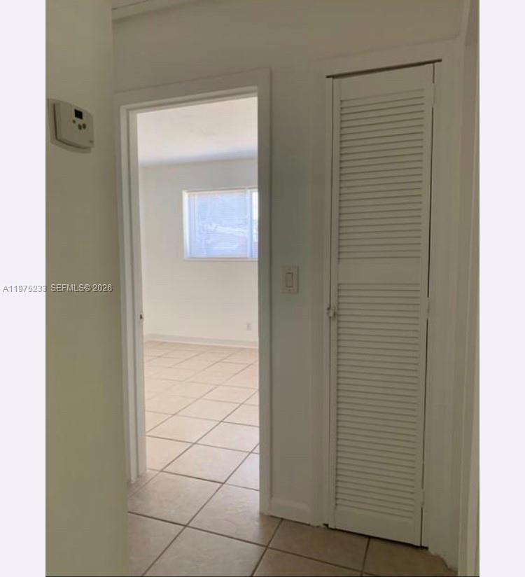 401 Southwest 8th Street, Unit A Hallandale Beach, FL 33009 - Photo 7 of 17 a view of a hallway