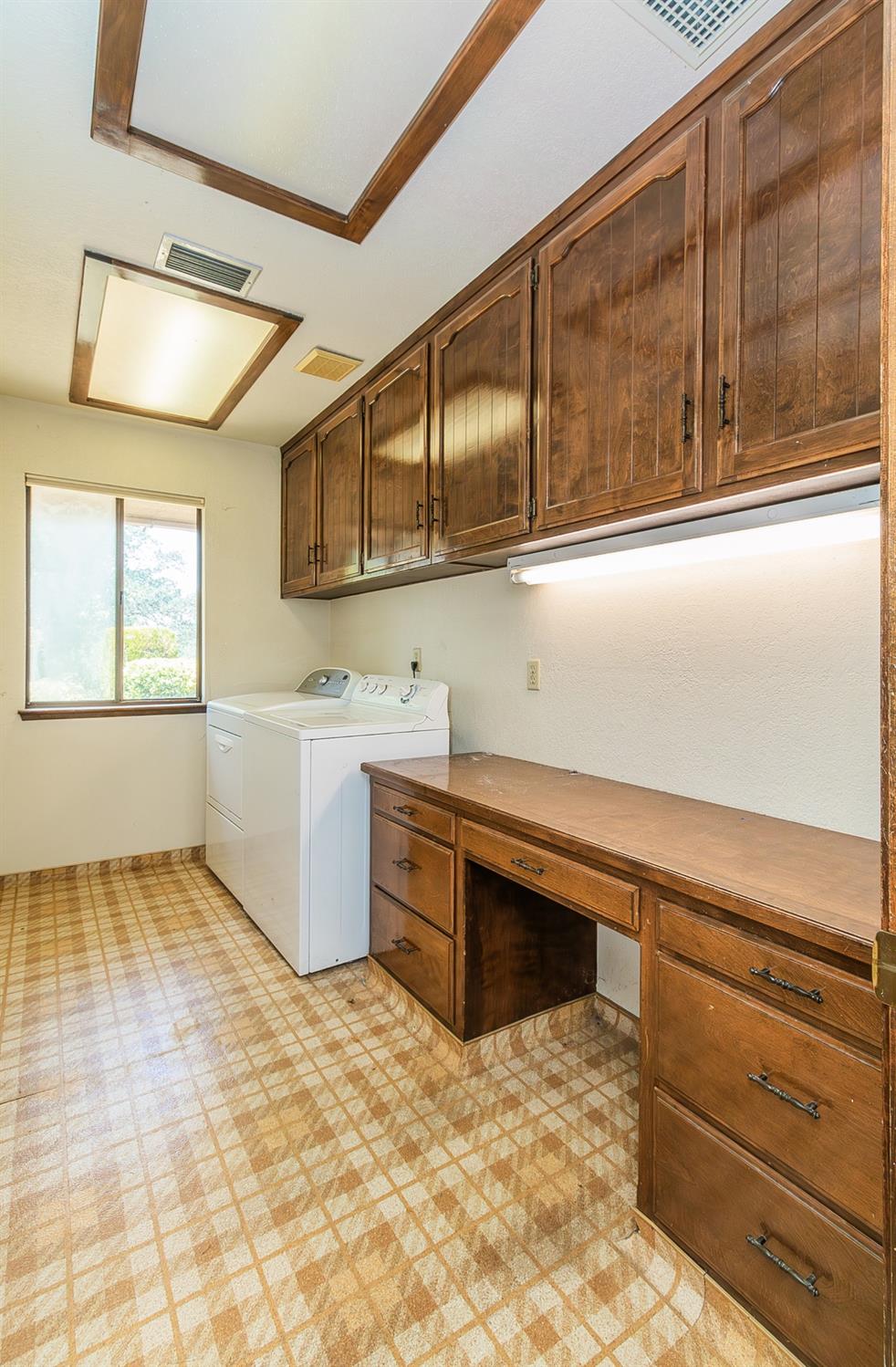10574 Millerton Road Clovis, CA 93619 - Photo 22 of 36 a kitchen with a sink and cabinets