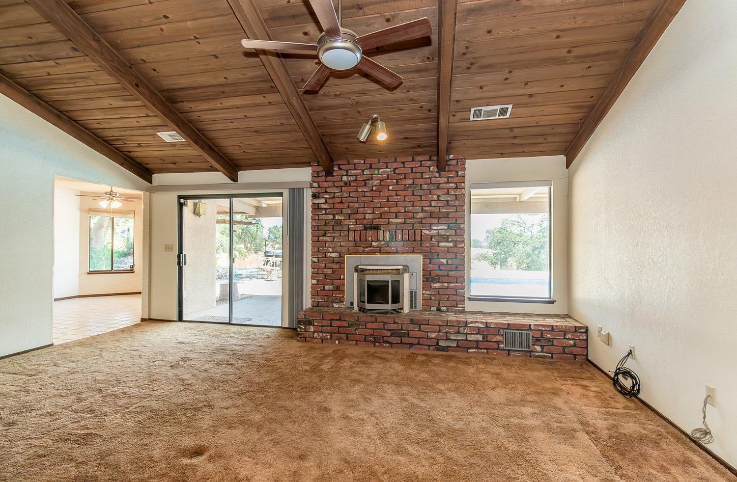10574 Millerton Road Clovis, CA 93619 - Photo 6 of 36 a view of an empty room with a window