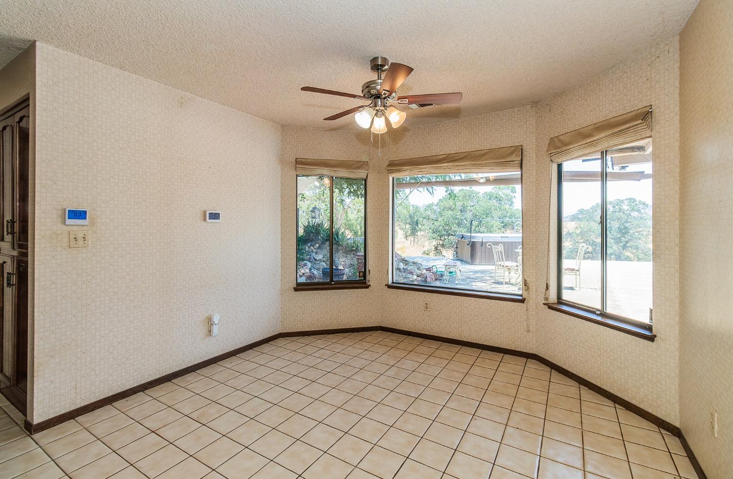 10574 Millerton Road Clovis, CA 93619 - Photo 10 of 36 a view of an empty room with a window