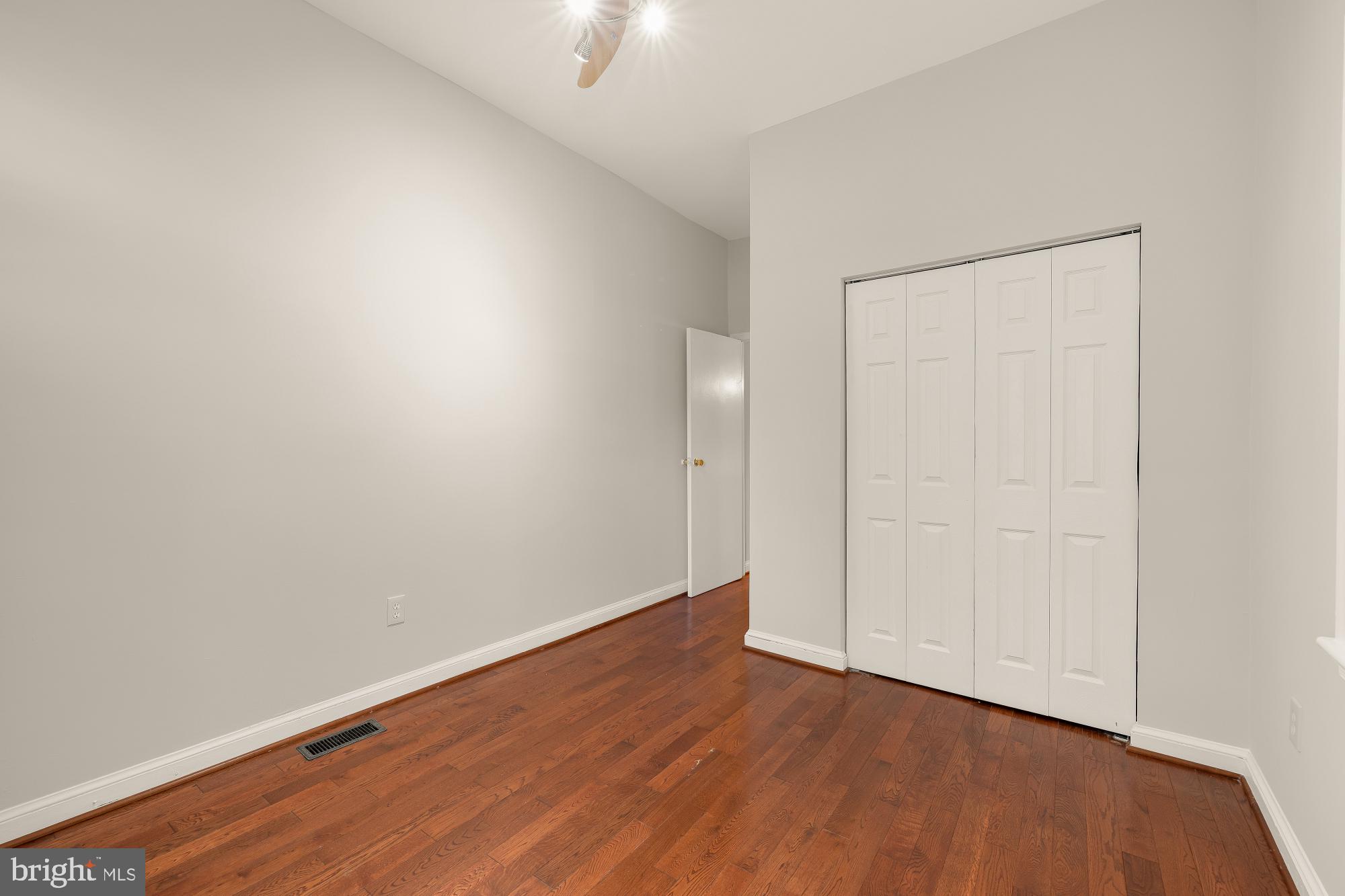 601 L Street Northeast Washington, DC 20002 - Photo 23 of 47 a view of an empty room with wooden floor
