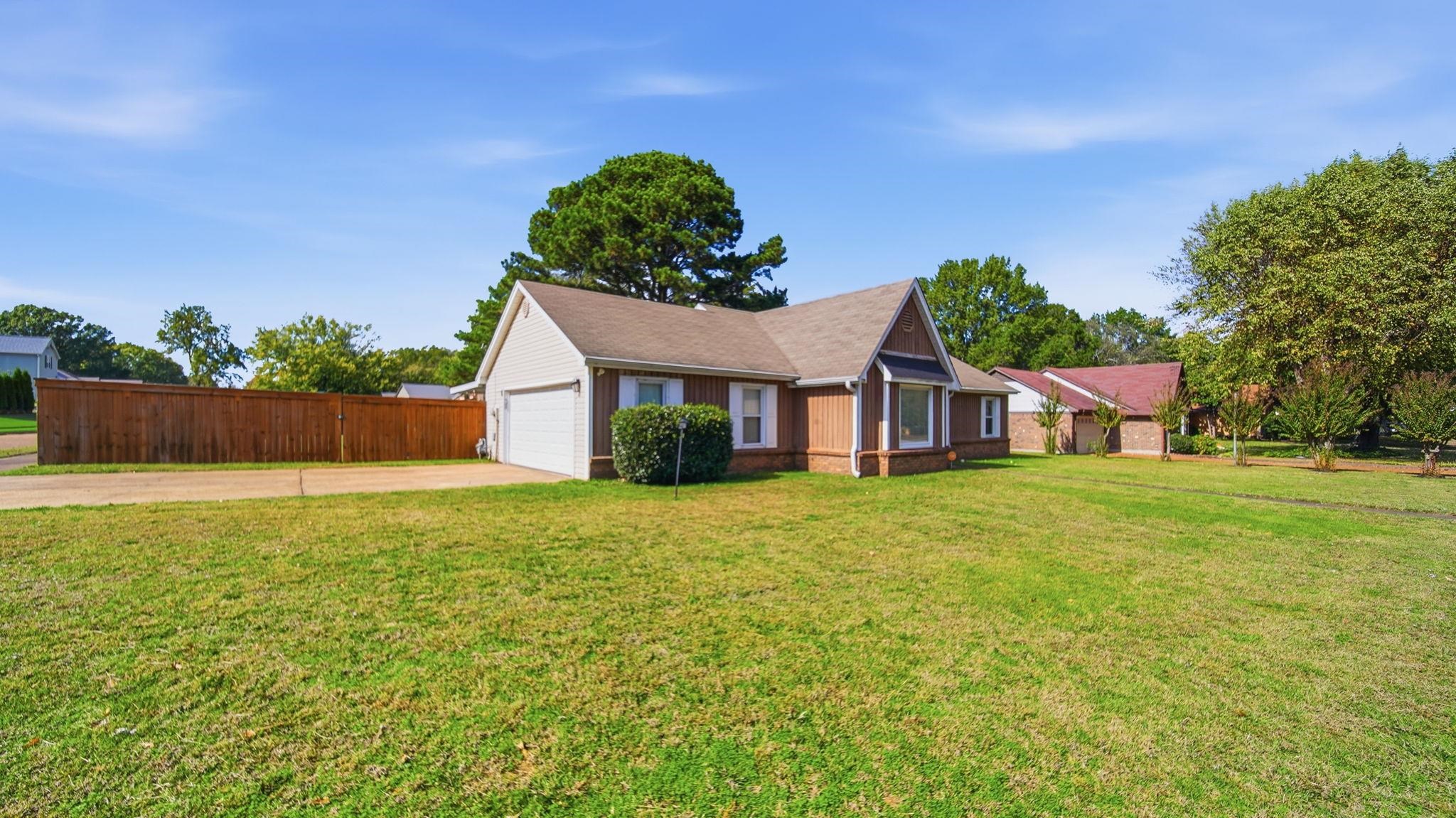 5069 Ross Road Memphis, TN 38141 - Photo 34 of 40 Ranch-style home featuring driveway and an attached garage