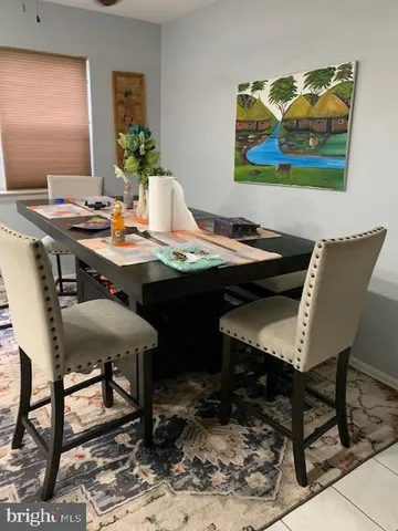 a view of a workspace with furniture