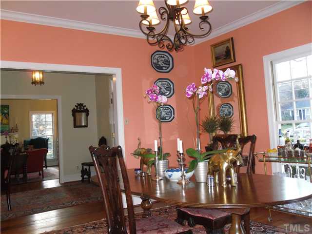 2406 Anderson Drive Raleigh, NC 27608 - Photo 11 of 25 a view of a dining room with furniture and wooden floor
