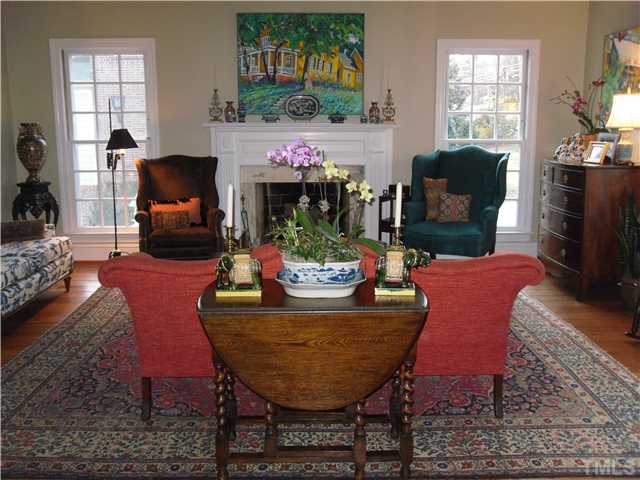 2406 Anderson Drive Raleigh, NC 27608 - Photo 5 of 25 a view of a dining room with furniture window and wooden floor