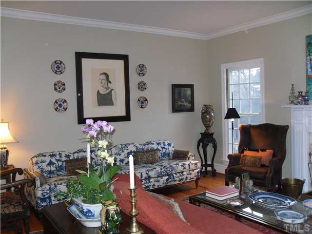 2406 Anderson Drive Raleigh, NC 27608 - Photo 6 of 25 a living room with furniture and wooden floor