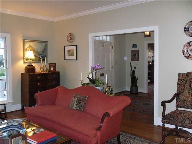 2406 Anderson Drive Raleigh, NC 27608 - Photo 8 of 25 a living room with furniture and wooden floor