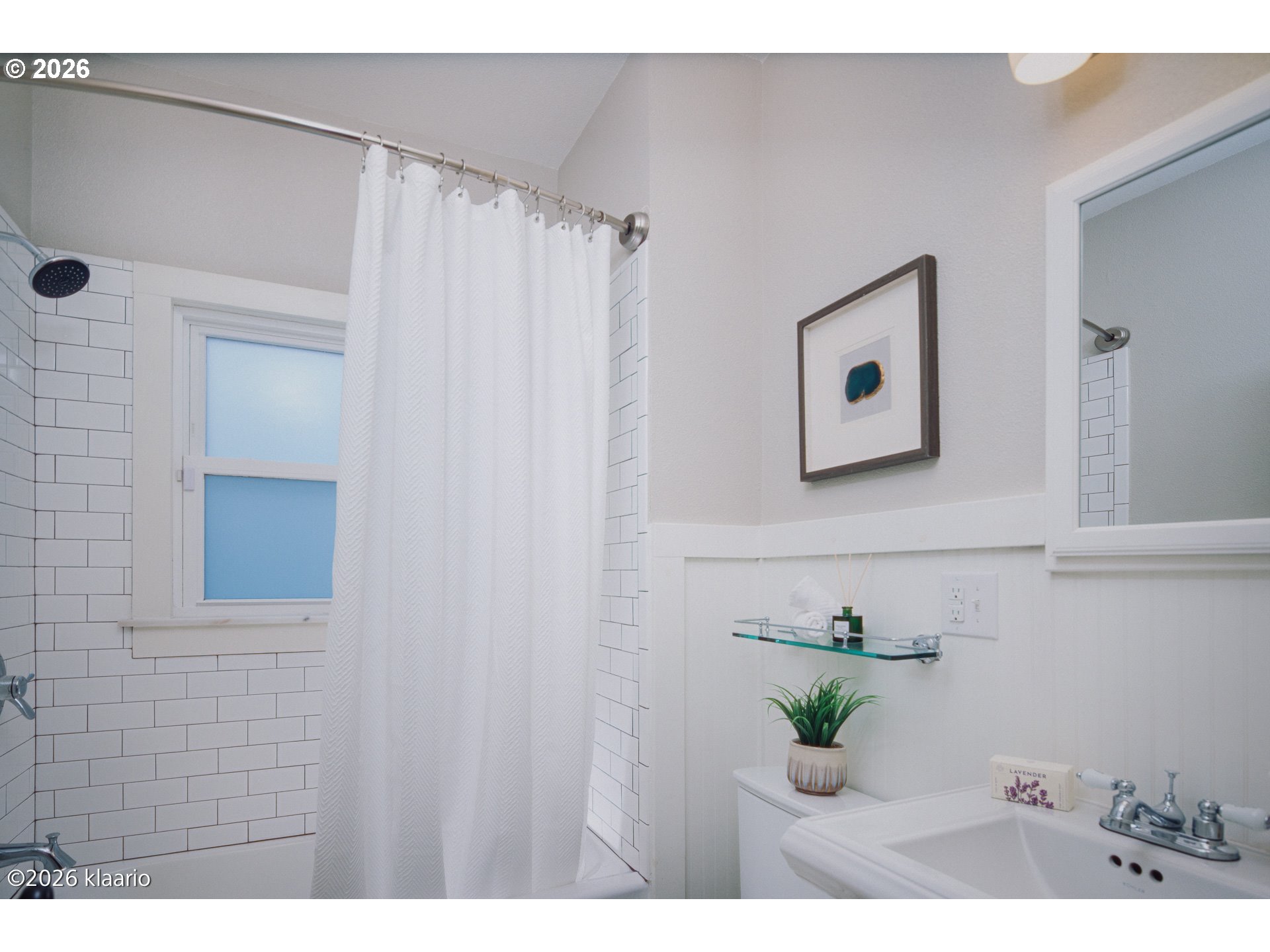 1253 North Baldwin Street Portland, OR 97217 - Photo 13 of 30 a view of bathroom with a shower and a sink