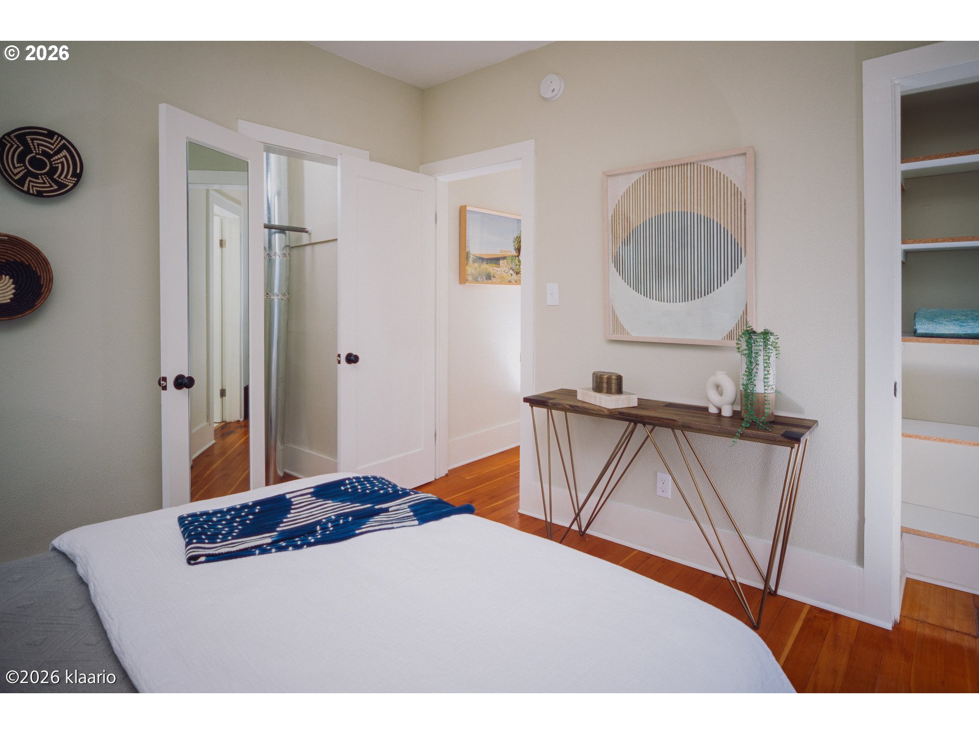 1253 North Baldwin Street Portland, OR 97217 - Photo 15 of 30 a bedroom with a bed and a dresser in it