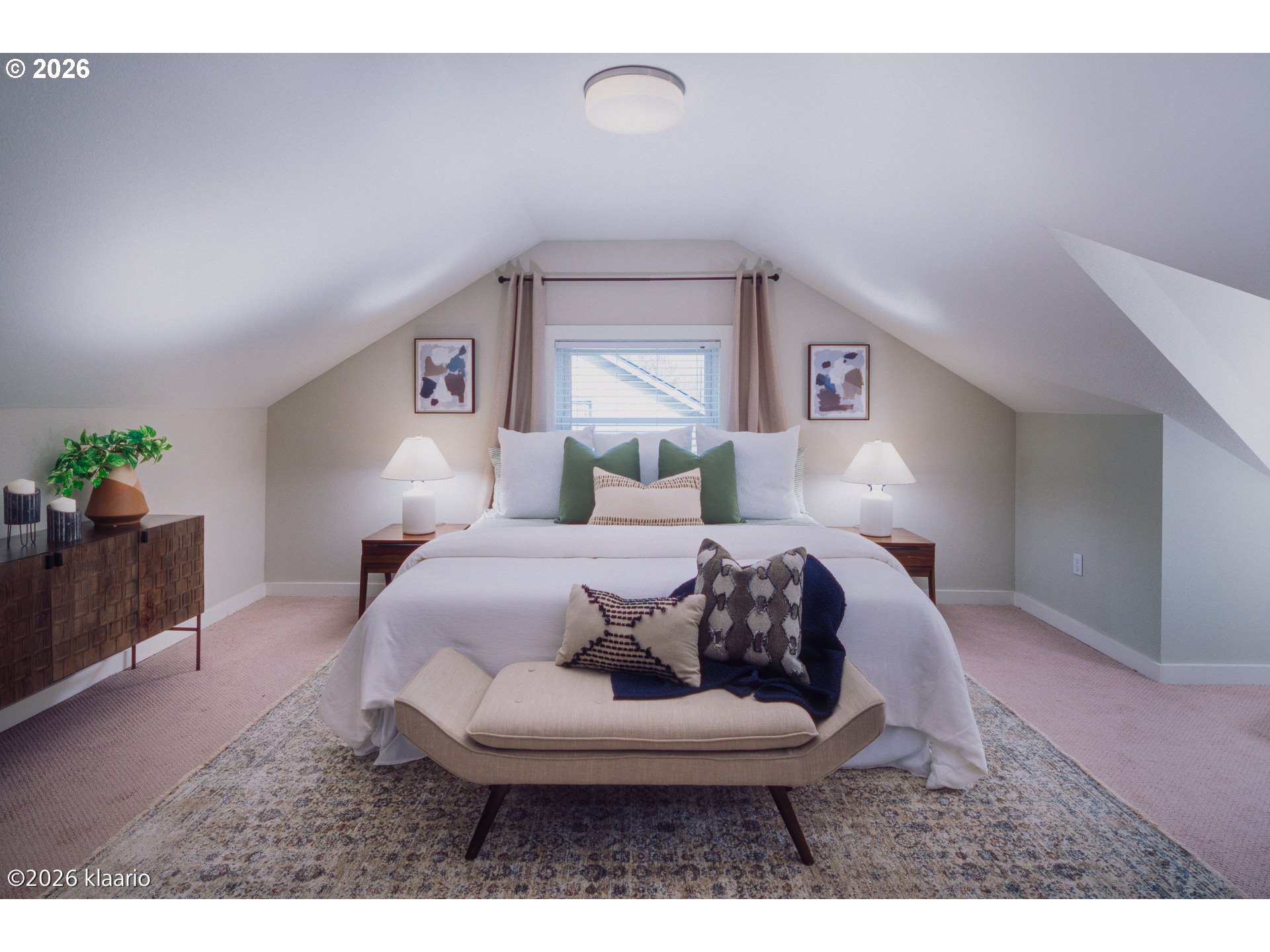 1253 North Baldwin Street Portland, OR 97217 - Photo 16 of 30 a bed room with a bed window and couch