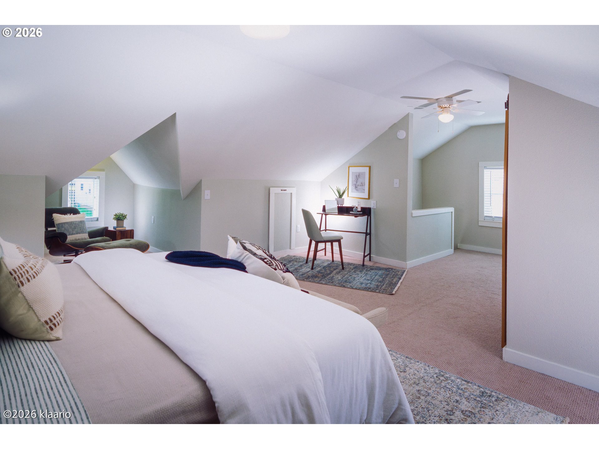 1253 North Baldwin Street Portland, OR 97217 - Photo 18 of 30 a bedroom with a bed and a chair