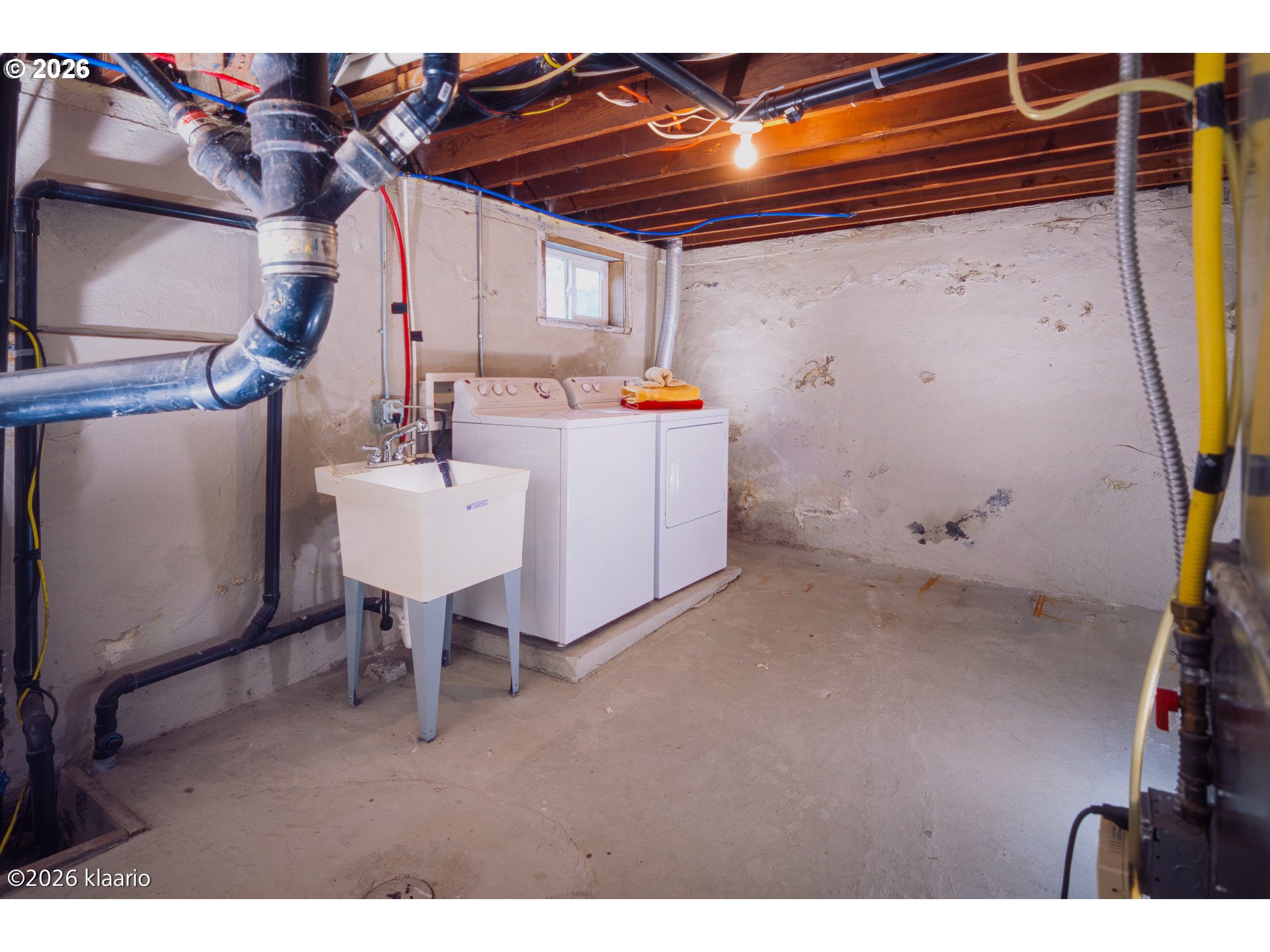 1253 North Baldwin Street Portland, OR 97217 - Photo 23 of 30 a utility room with dryer and washer