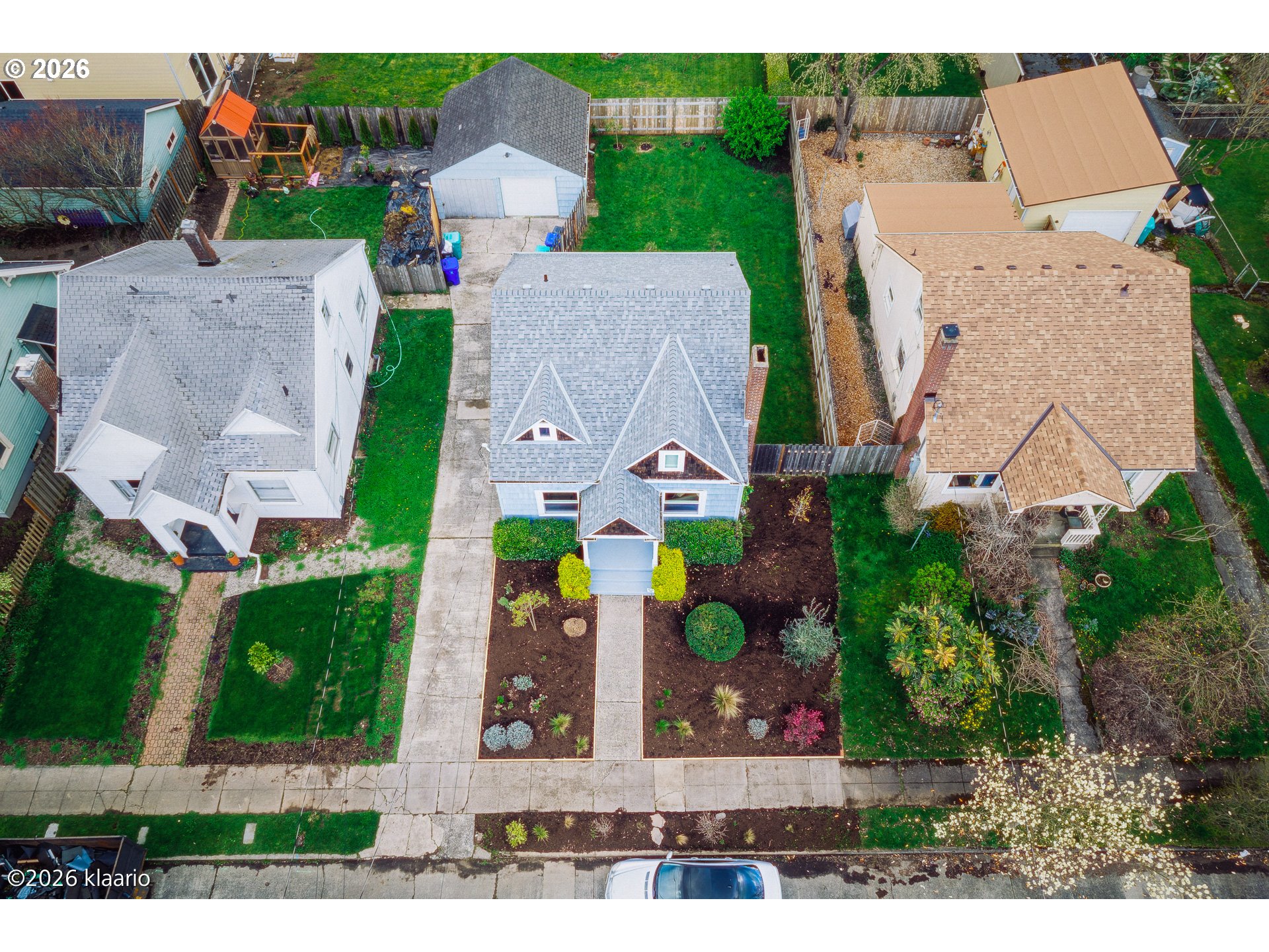 1253 North Baldwin Street Portland, OR 97217 - Photo 24 of 30 an aerial view of residential houses with outdoor space and street view