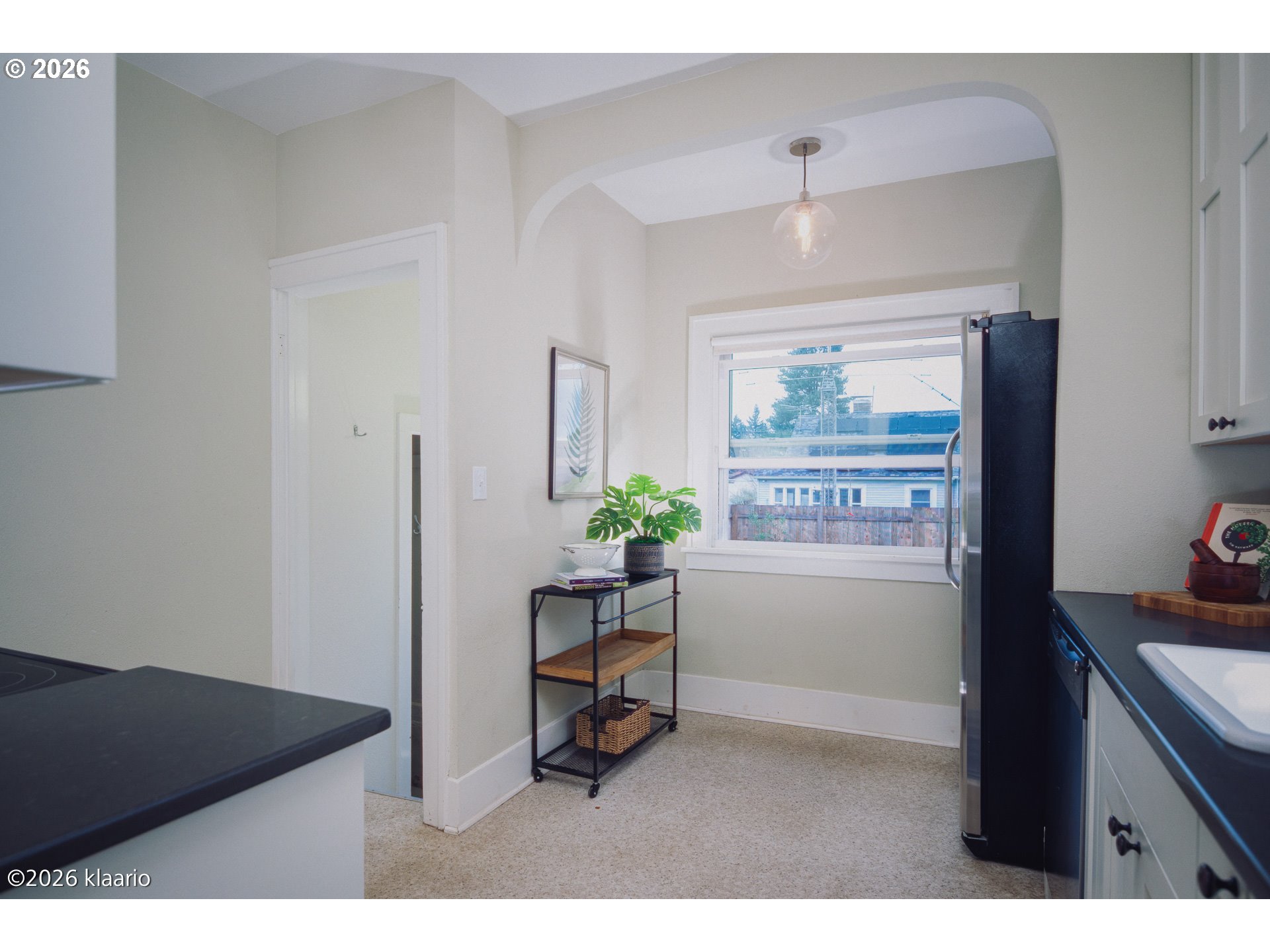 1253 North Baldwin Street Portland, OR 97217 - Photo 9 of 30 a workspace with furniture and a potted plant