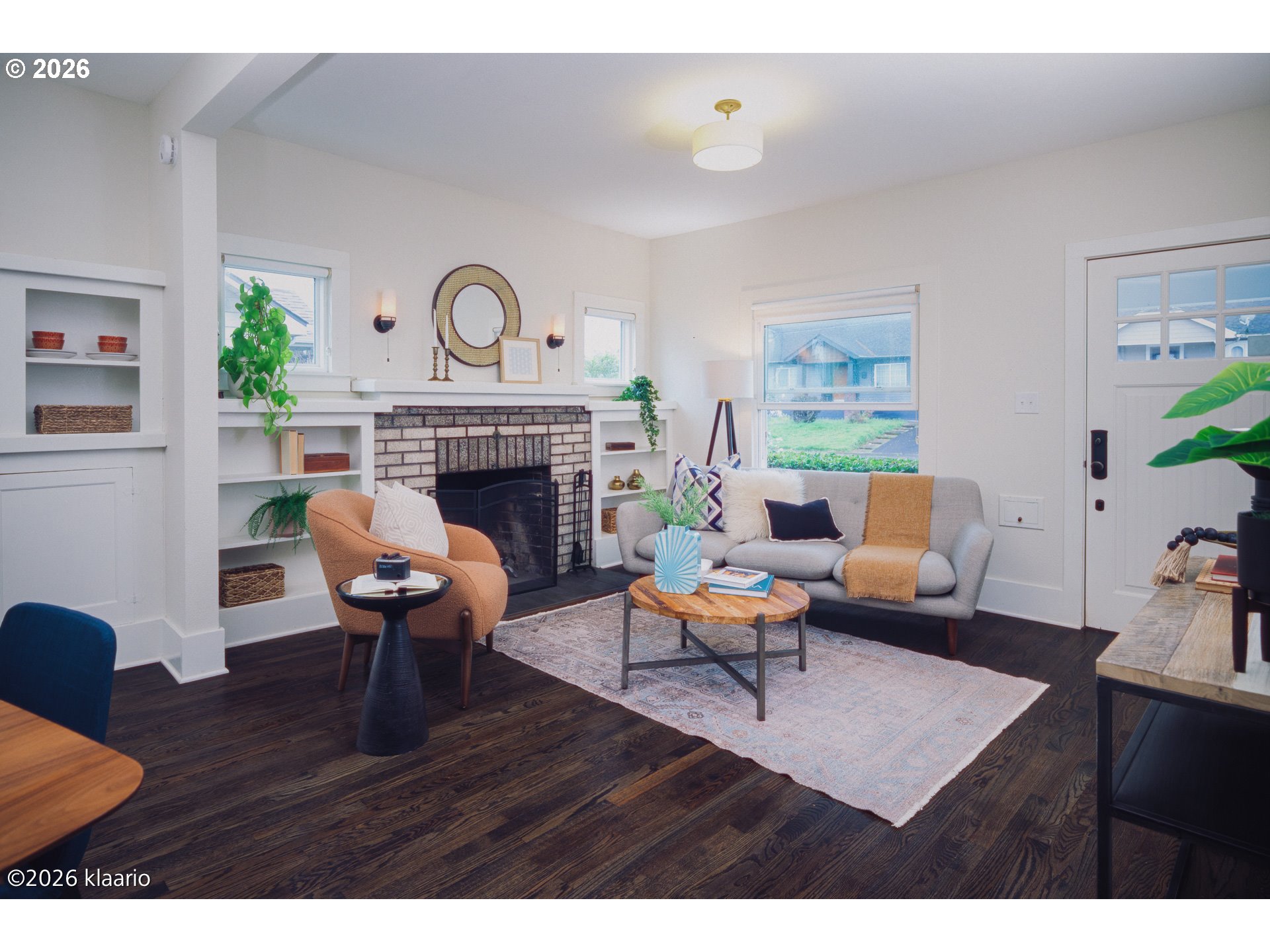 1253 North Baldwin Street Portland, OR 97217 - Photo 10 of 30 a living room with furniture a fireplace and a table