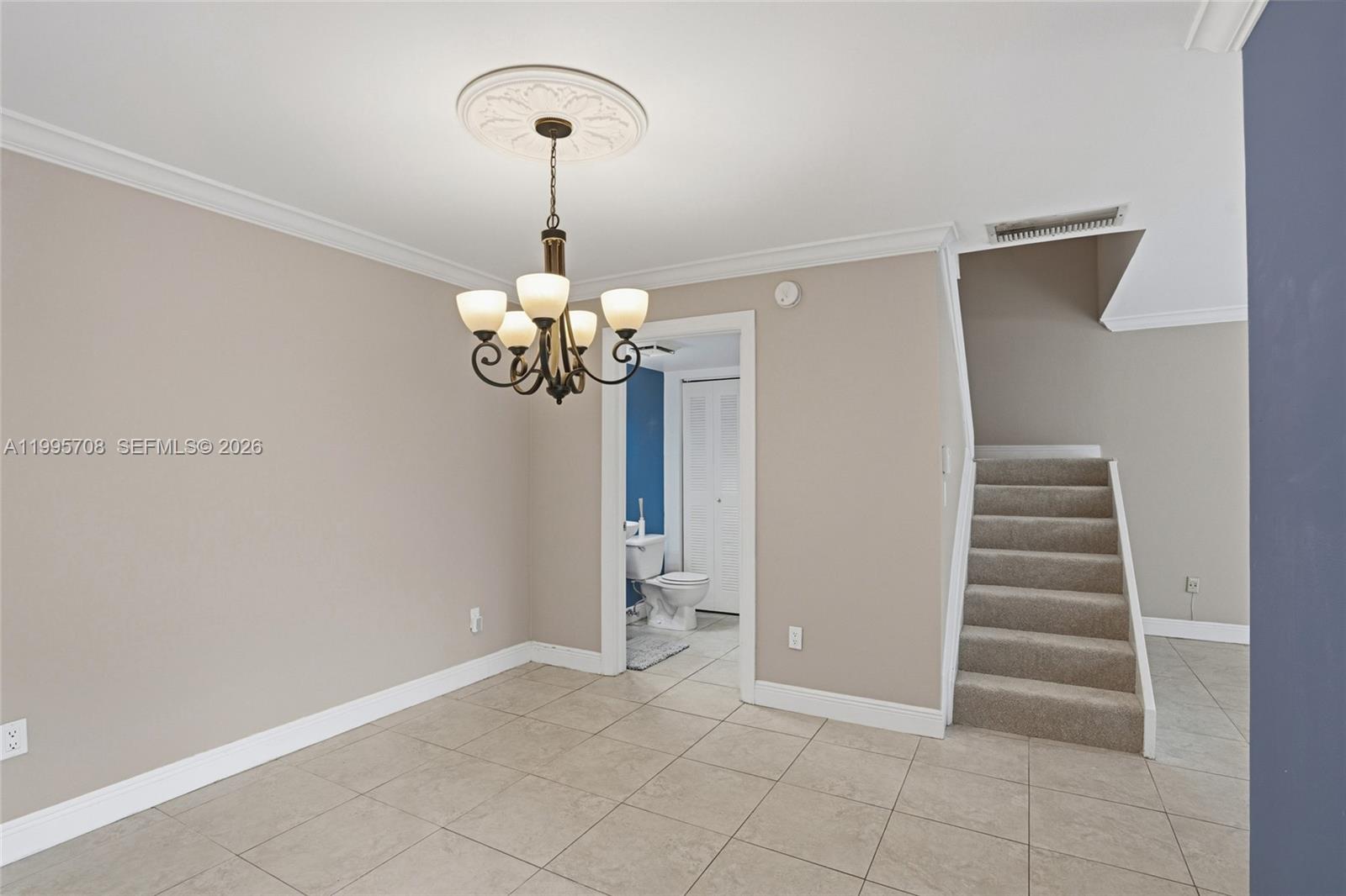 13993 Southwest 94th Cir Lane, Unit 1013 Miami, FL 33186 - Photo 16 of 36 a view of an empty room with a window
