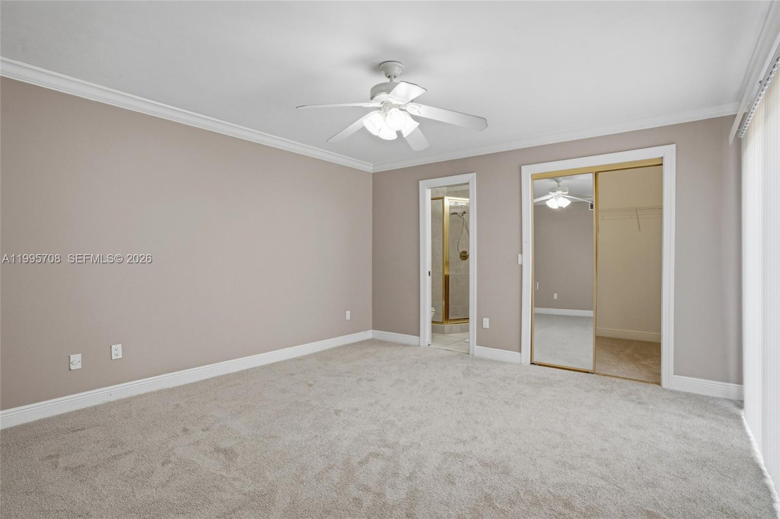 13993 Southwest 94th Cir Lane, Unit 1013 Miami, FL 33186 - Photo 19 of 36 a view of an empty room with a ceiling fan