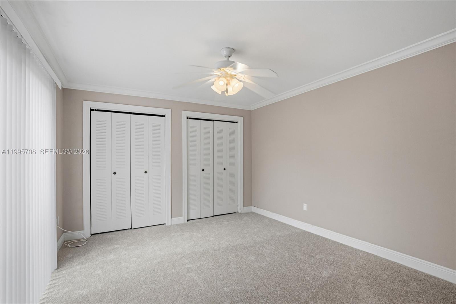 13993 Southwest 94th Cir Lane, Unit 1013 Miami, FL 33186 - Photo 23 of 36 a view of an empty room with a window