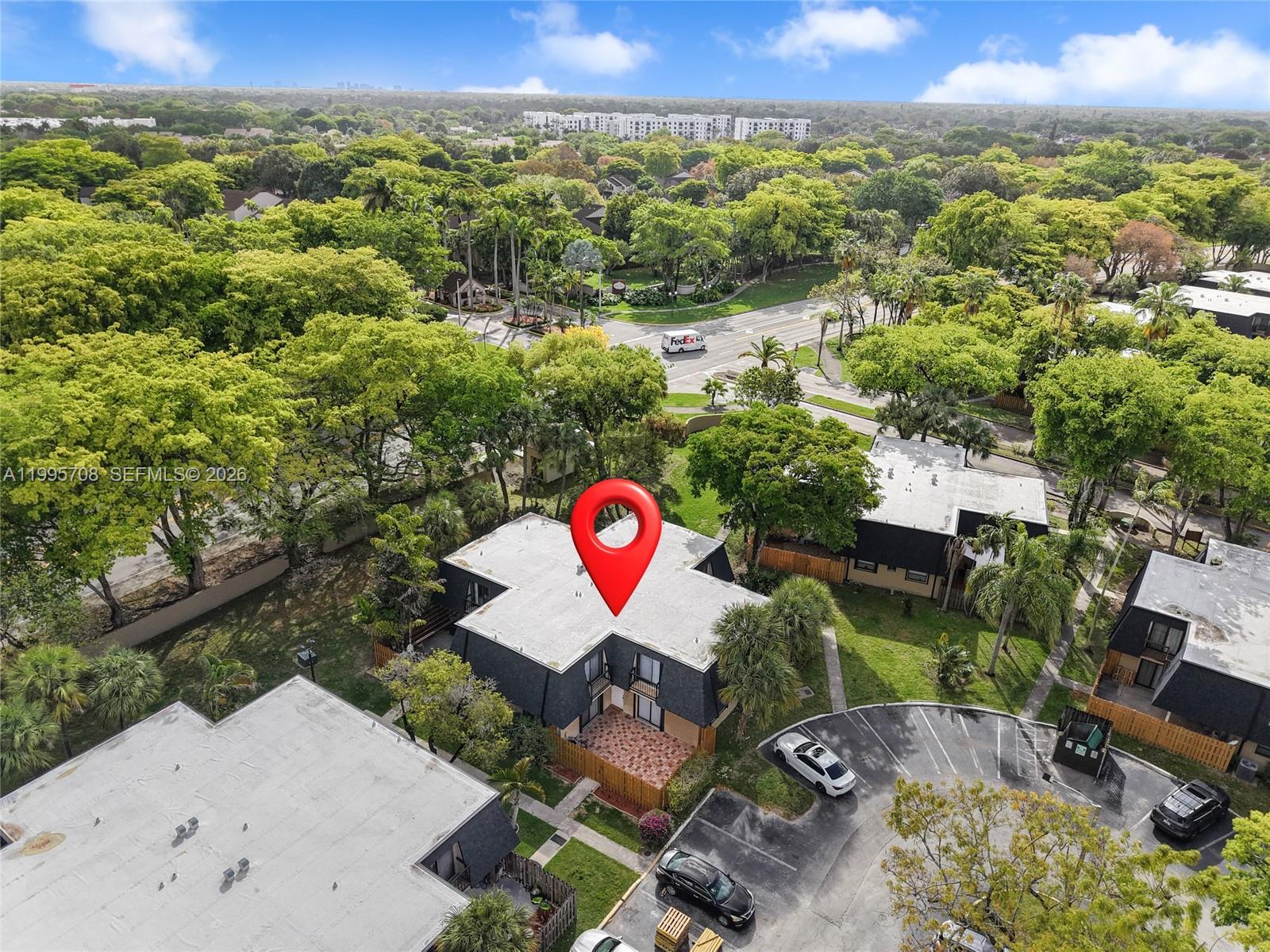 13993 Southwest 94th Cir Lane, Unit 1013 Miami, FL 33186 - Photo 32 of 36 an aerial view of a house with a yard