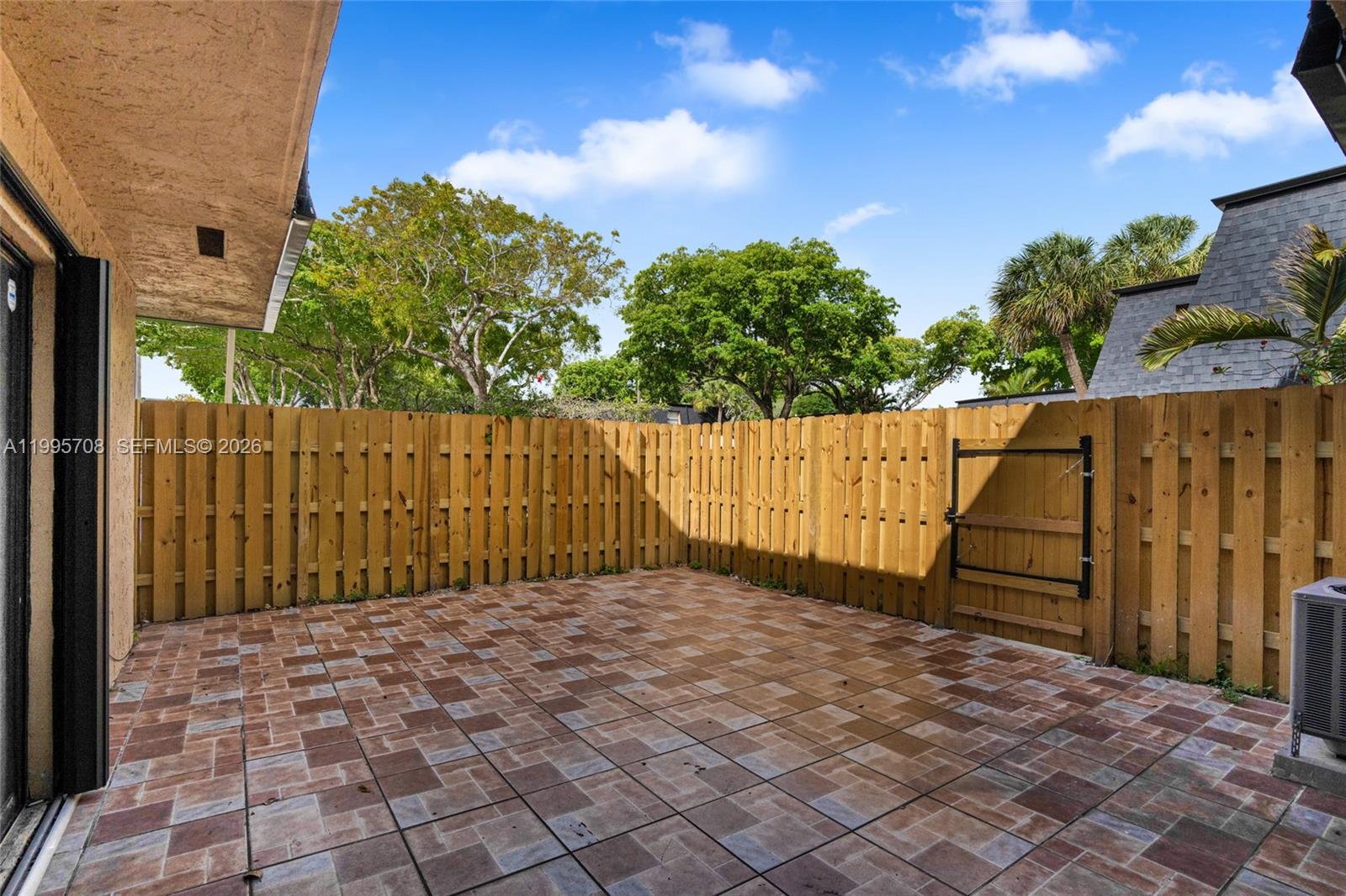 13993 Southwest 94th Cir Lane, Unit 1013 Miami, FL 33186 - Photo 5 of 36 a view of a black gate