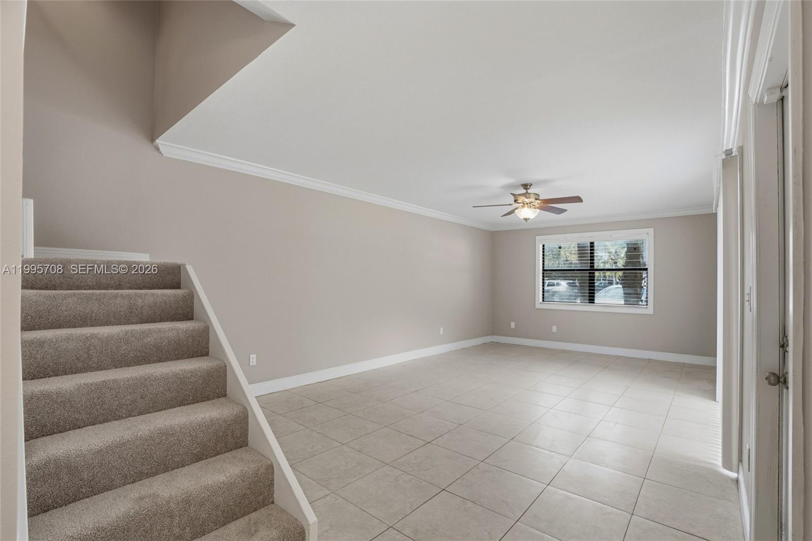 13993 Southwest 94th Cir Lane, Unit 1013 Miami, FL 33186 - Photo 9 of 36 an empty room with windows