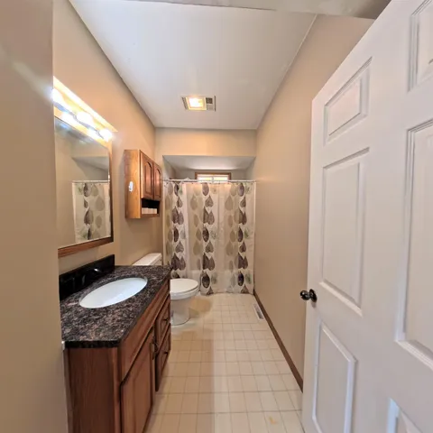 a room with furniture and window