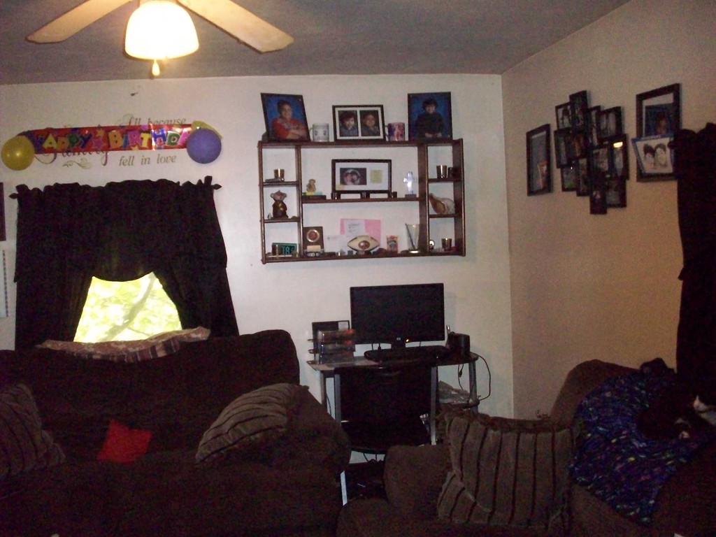 49 South Sturbridge Road Charlton, MA 01507 - Photo 23 of 30 a living room with furniture and a lamp