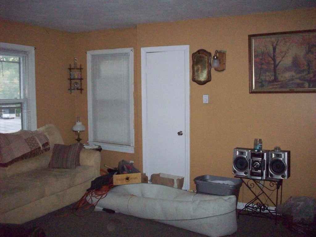 49 South Sturbridge Road Charlton, MA 01507 - Photo 5 of 30 a living room with furniture and a window