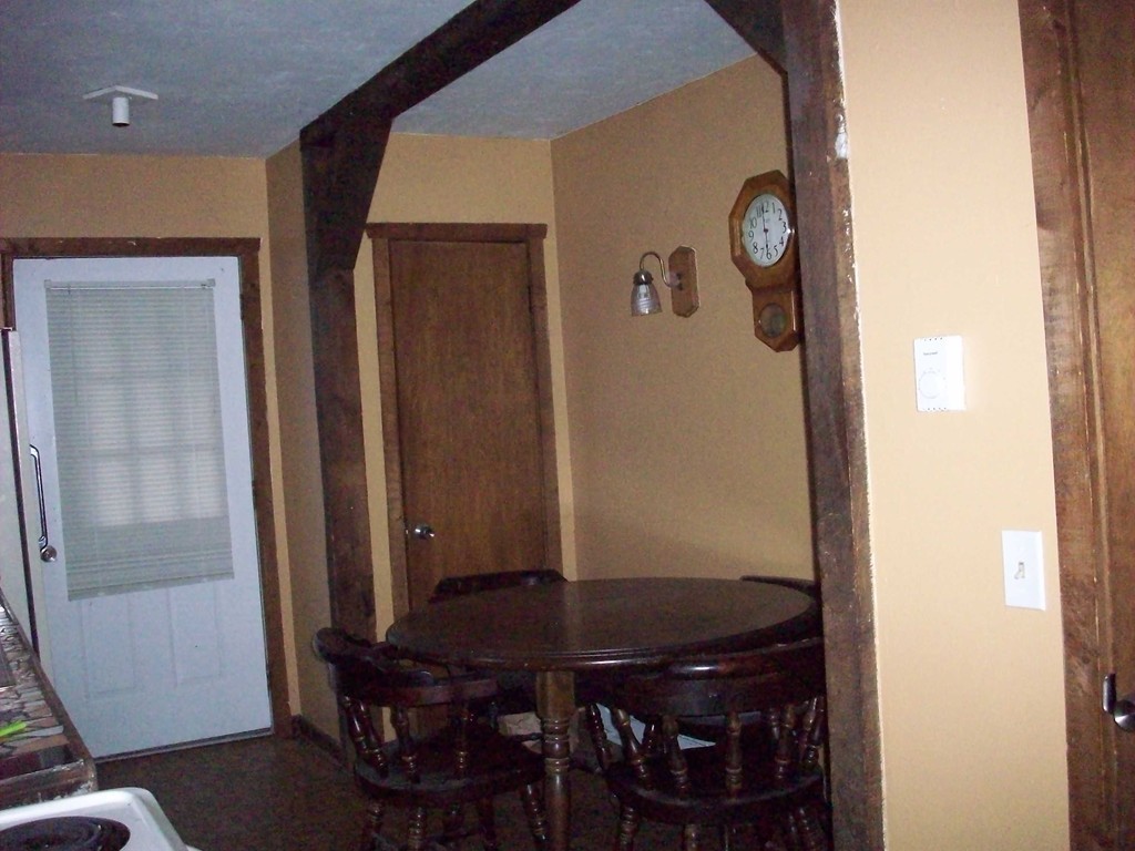 49 South Sturbridge Road Charlton, MA 01507 - Photo 8 of 30 a view of a dining room with furniture and wooden floor