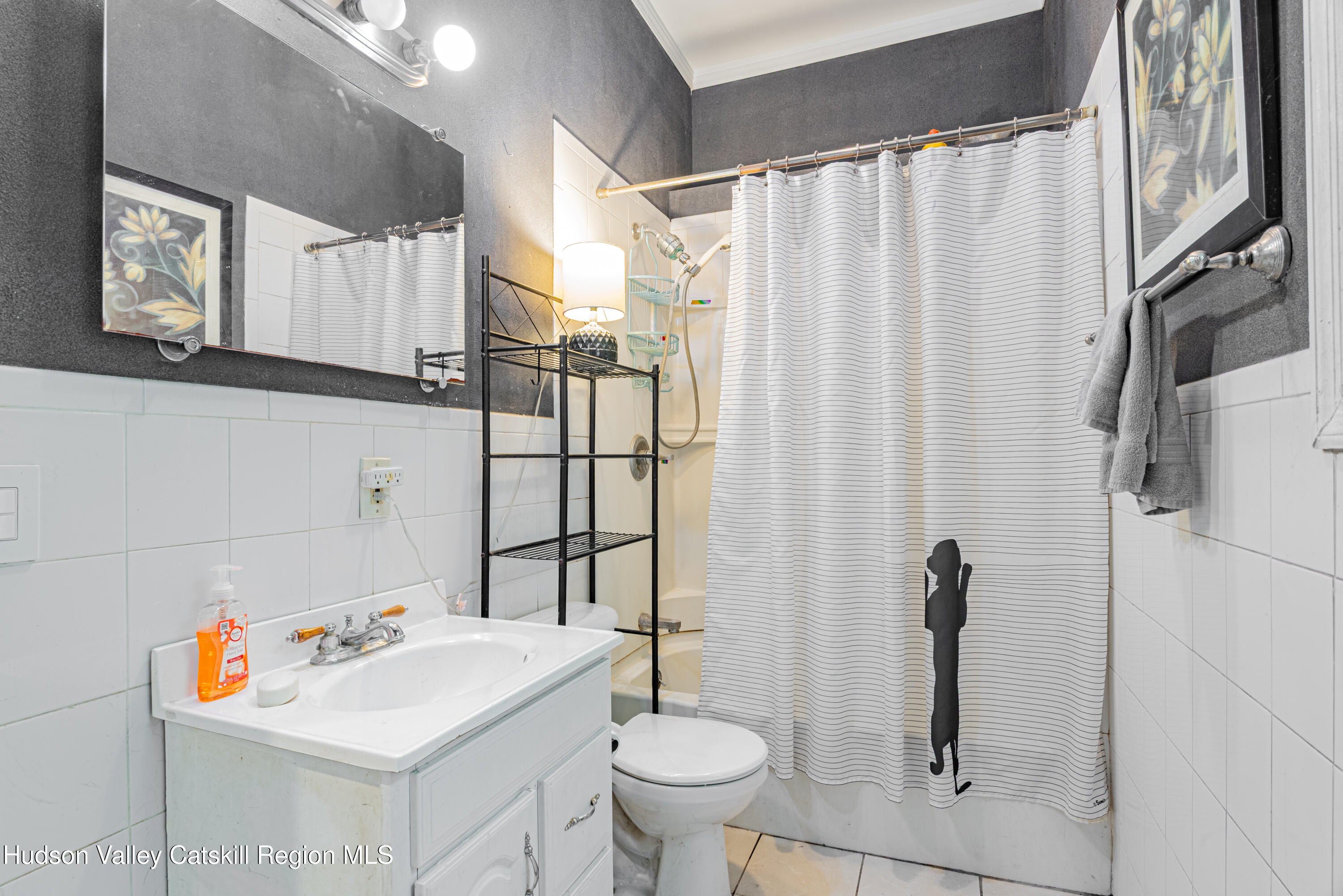 233 Rossway Road Pleasant Valley, NY 12569 - Photo 14 of 22 a bathroom with a sink toilet and shower