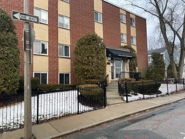 a kitchen with granite countertop a sink stainless steel appliances and counter space