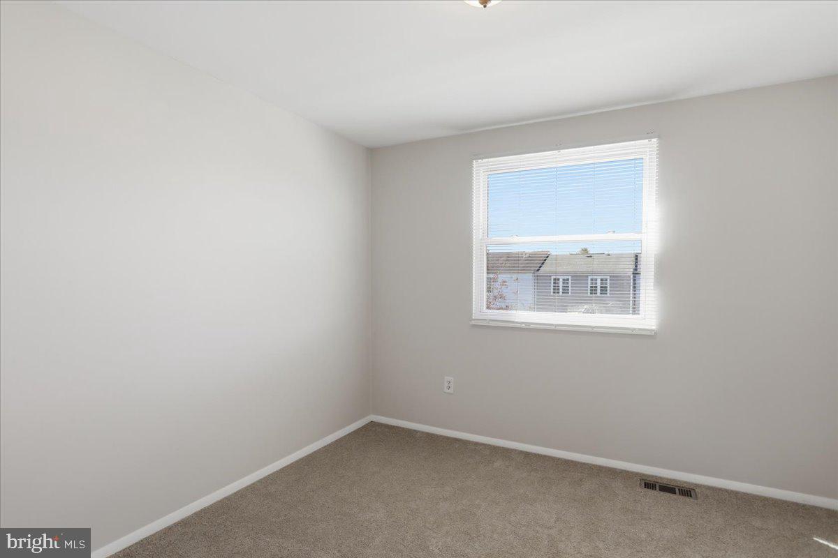 6734 Fallow Hill Court Frederick, MD 21703 - Photo 17 of 29 an empty room with a window