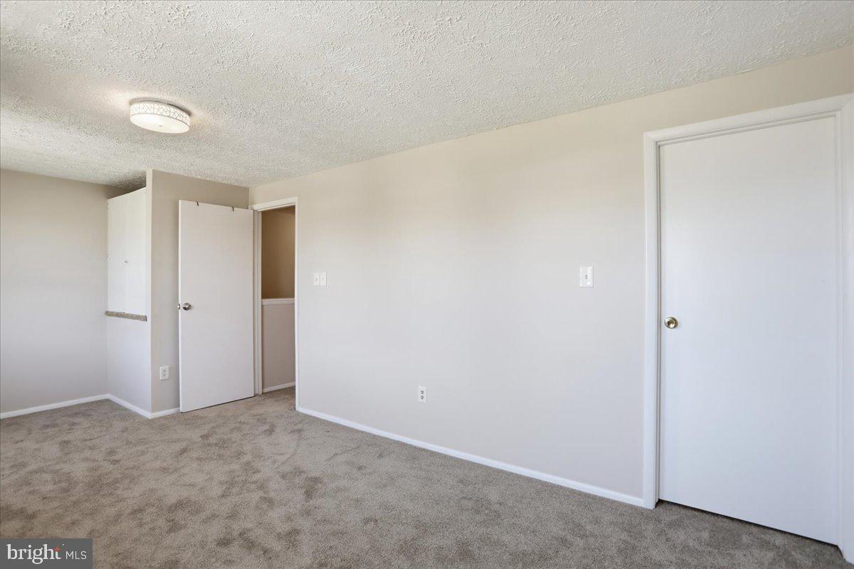 6734 Fallow Hill Court Frederick, MD 21703 - Photo 22 of 29 a view of an empty room