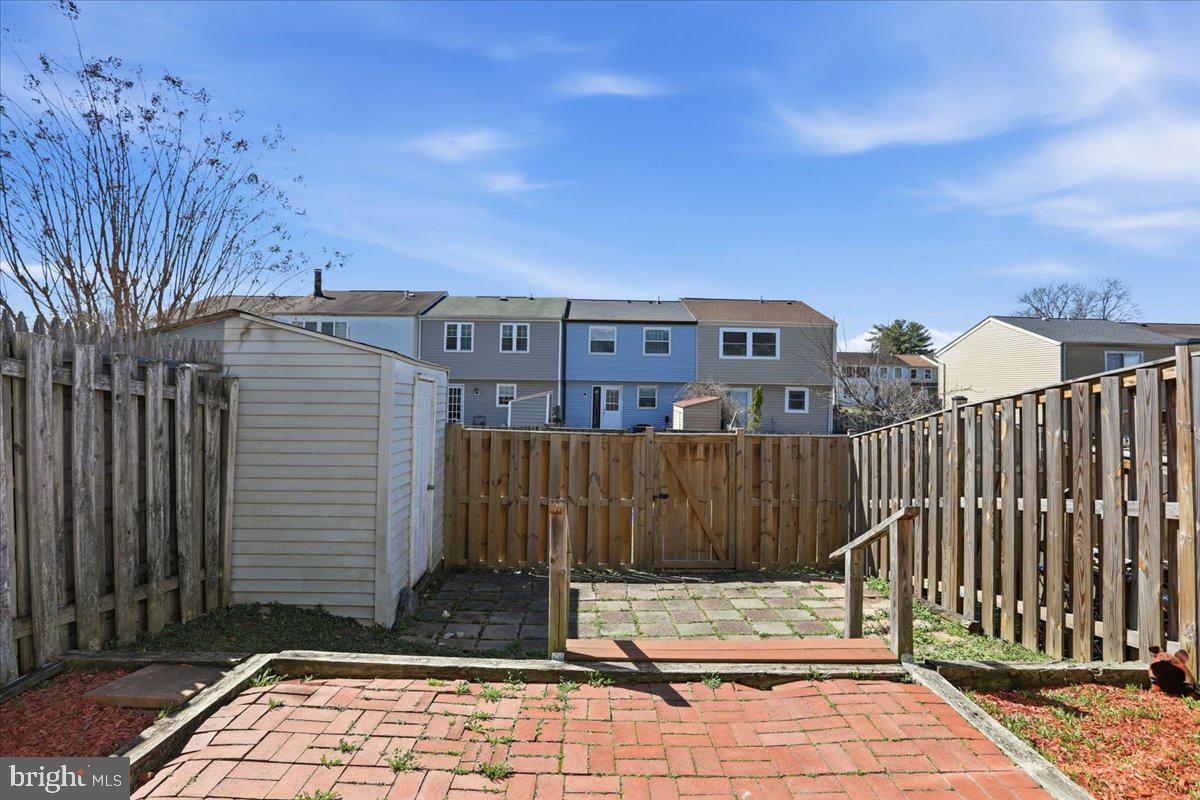 6734 Fallow Hill Court Frederick, MD 21703 - Photo 26 of 29 a view of a brick wall with a small garden