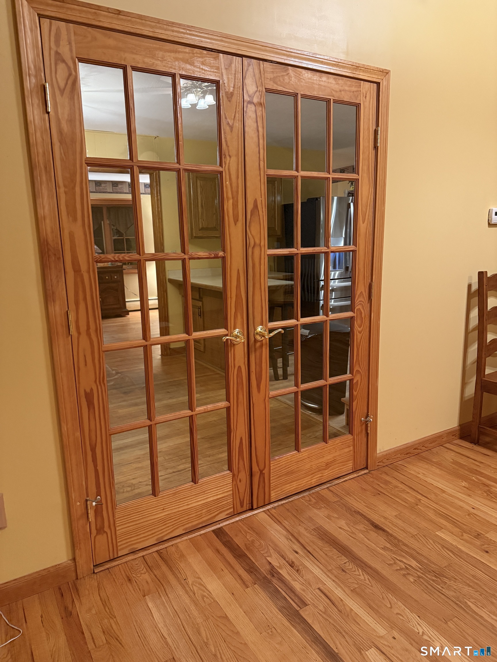 112 Maple Street Seymour, CT 06483 - Photo 11 of 34 French doors from dining room into Great Room