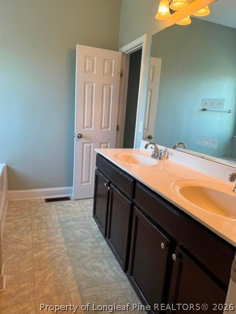 1284 L Cooper Road Cameron, NC 28326 - Photo 8 of 24 a bathroom with a sink and a mirror