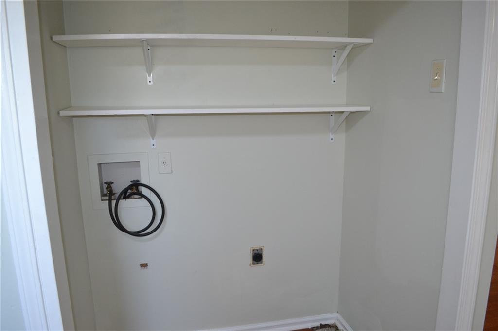 555 Lee Byrd Road Loganville, GA 30052 - Photo 12 of 23 a bathroom with a sink