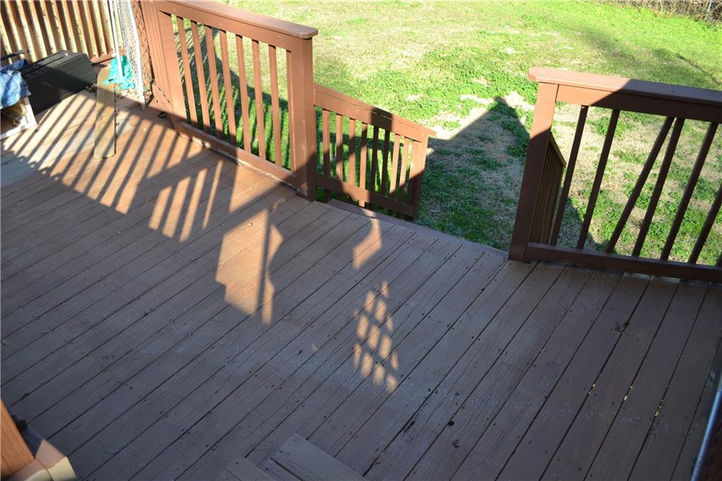 555 Lee Byrd Road Loganville, GA 30052 - Photo 6 of 23 a view of deck with patio