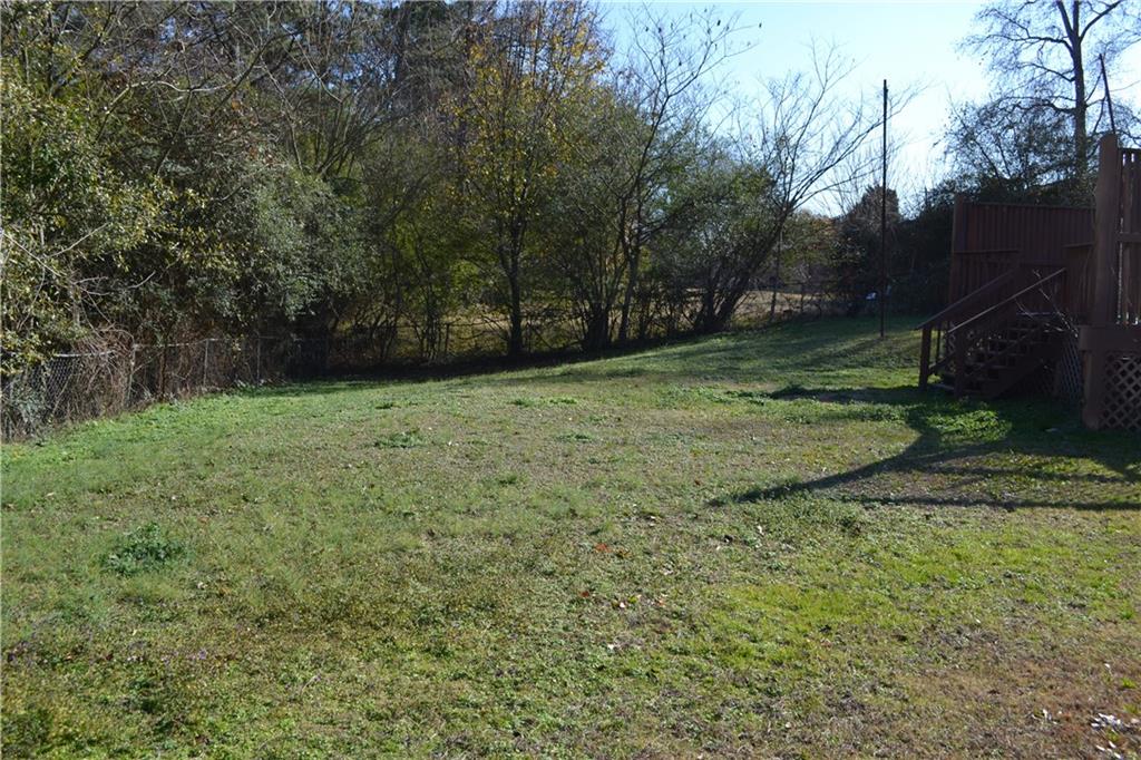 555 Lee Byrd Road Loganville, GA 30052 - Photo 10 of 23 a view of a backyard