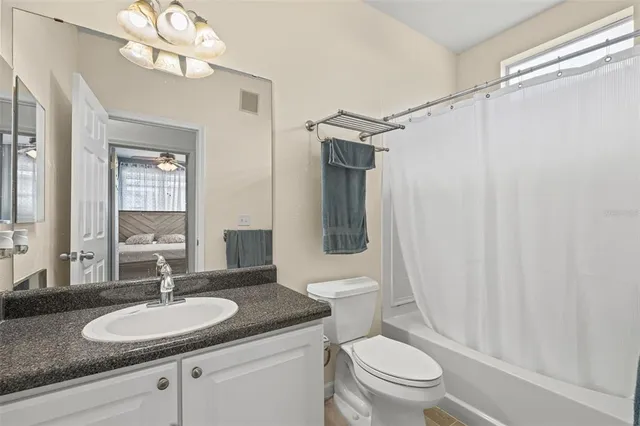 a front view of a house with a yard table and chairs