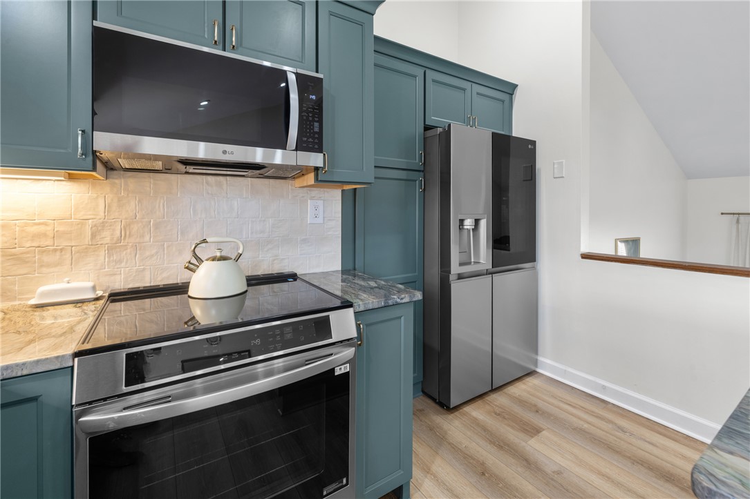 111 Shorecrest Drive Seneca, SC 29672 - Photo 13 of 35 This modern kitchen features sleek appliances and ample storage, perfect for culinary enthusiasts.