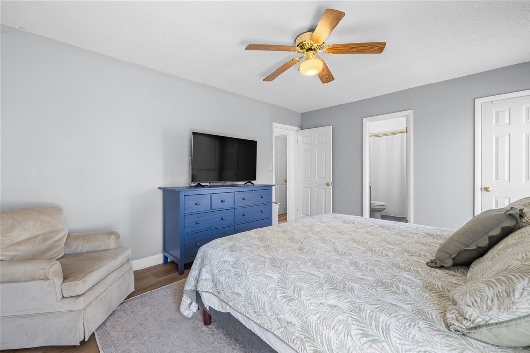 111 Shorecrest Drive Seneca, SC 29672 - Photo 16 of 35 This tranquil bedroom features a ceiling fan, creating a refreshing and comfortable retreat.