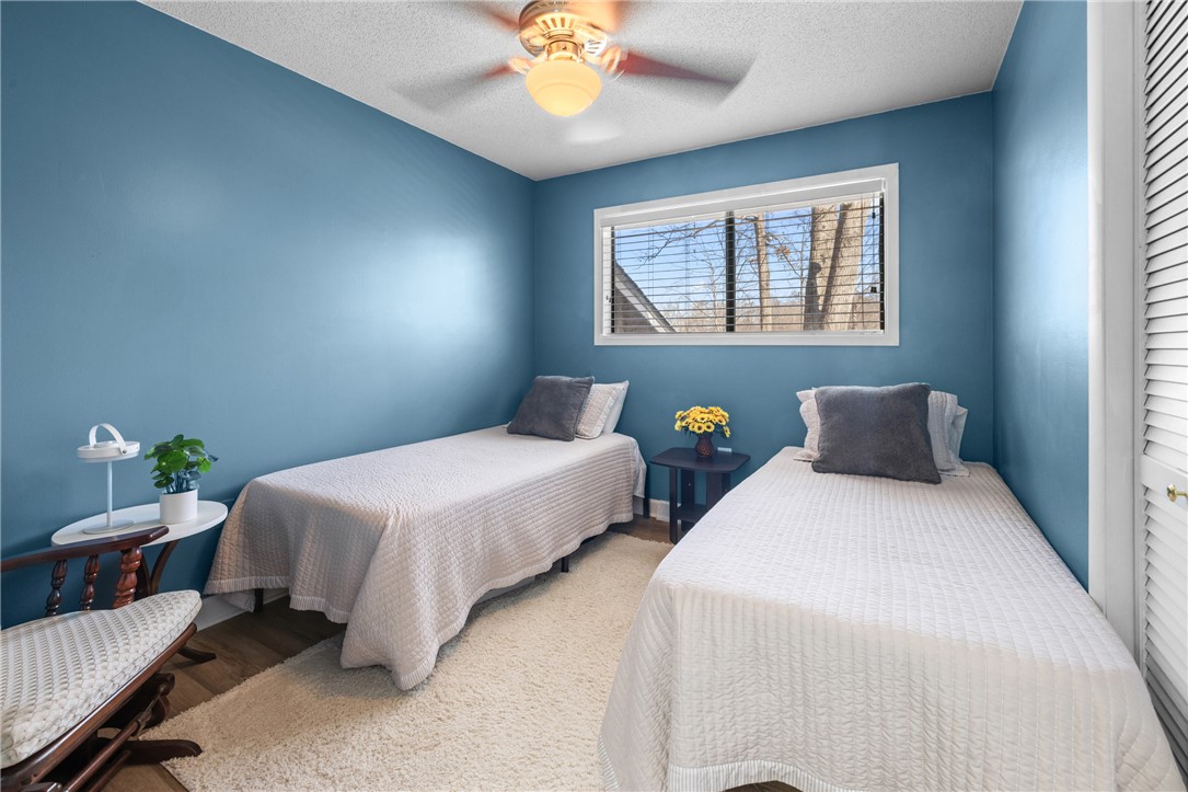 111 Shorecrest Drive Seneca, SC 29672 - Photo 18 of 35 This cozy bedroom features a ceiling fan, a window, and comfortable flooring for a peaceful retreat.
