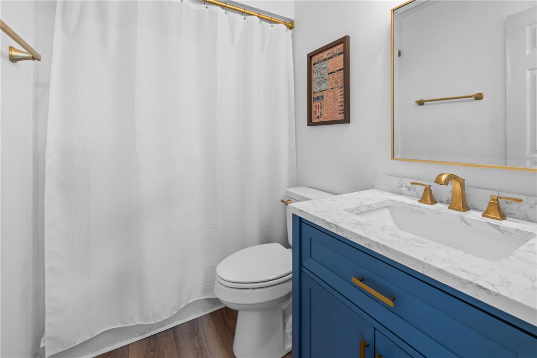111 Shorecrest Drive Seneca, SC 29672 - Photo 19 of 35 This clean bathroom features a modern vanity and practical shower area.